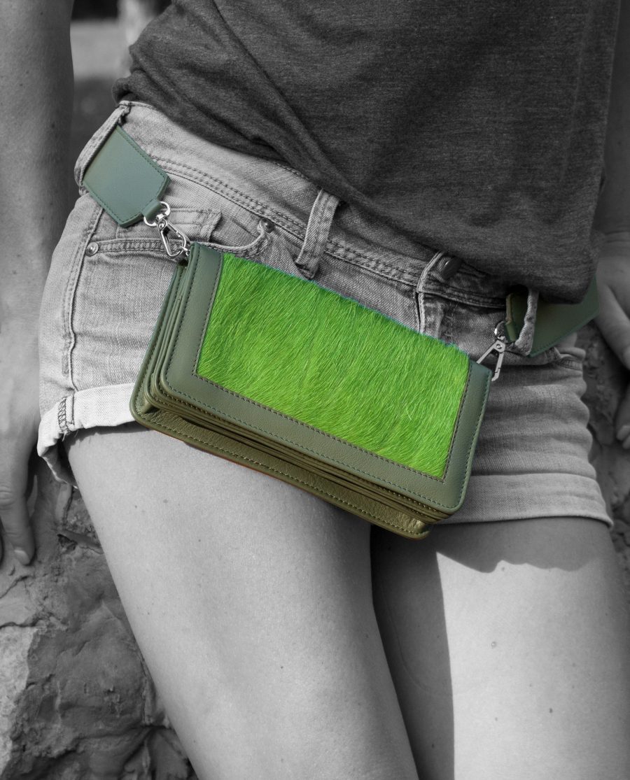 Olive Green Calf Hair Leather Clutch Bag In woman hands hips