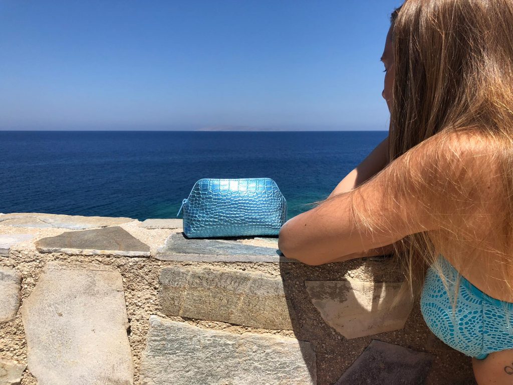 Woman with Turquoise Cosmetic Bag 4.jpeg